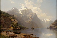 Alpine lake with a view of a mountain range