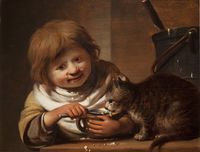 Child Feeding a Cat